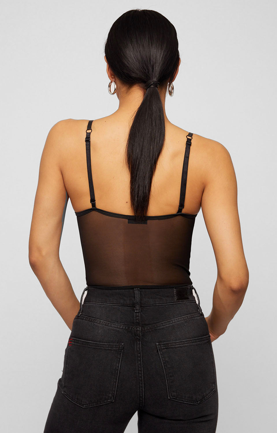 STRAPPY LEATHER BODYSUIT